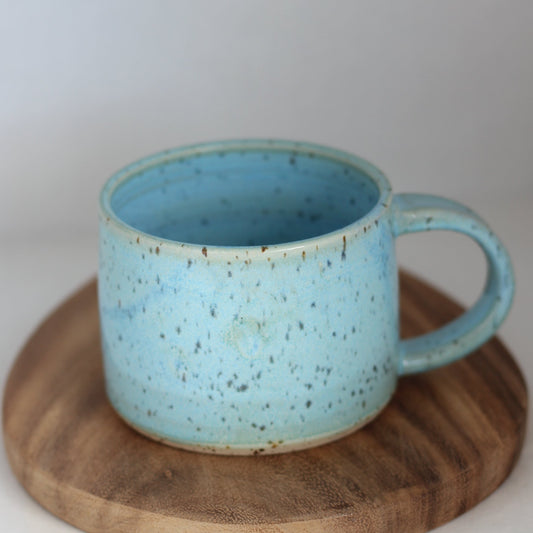 Turkisblått spettet krus